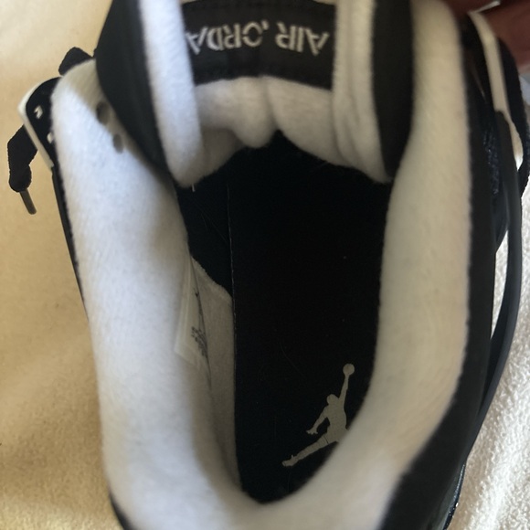Air Jordan Black and White Sneakers - Picture 1 of 4